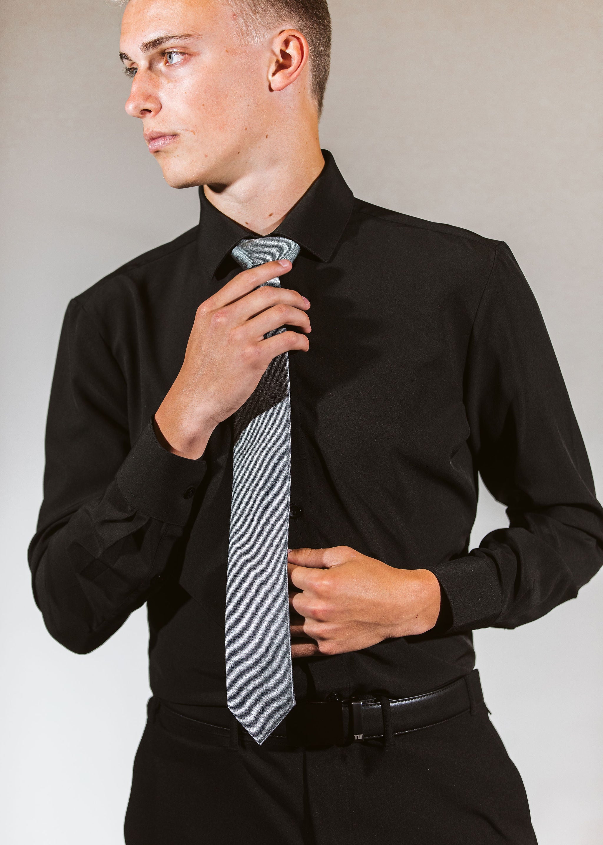 How do I avoid ruining the collar on a men's dress shirt?